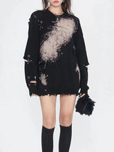 Pull en tricot à motif trombone cassé